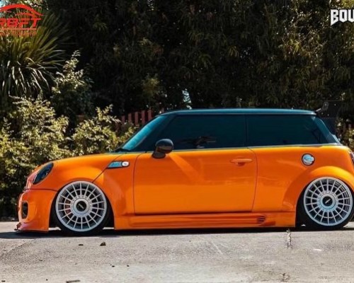 Orange mini cooper air ride exclusive styling