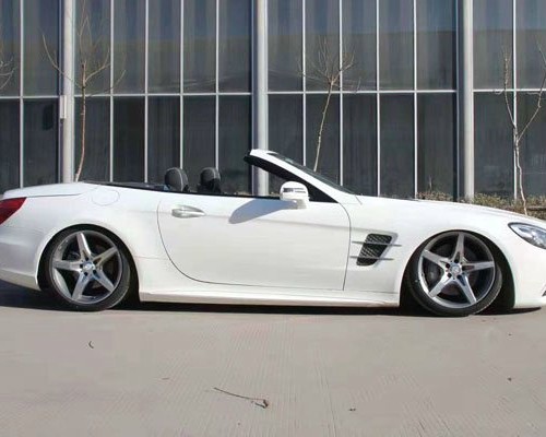 Pretty and charming white Mercedes Benz SLK airride